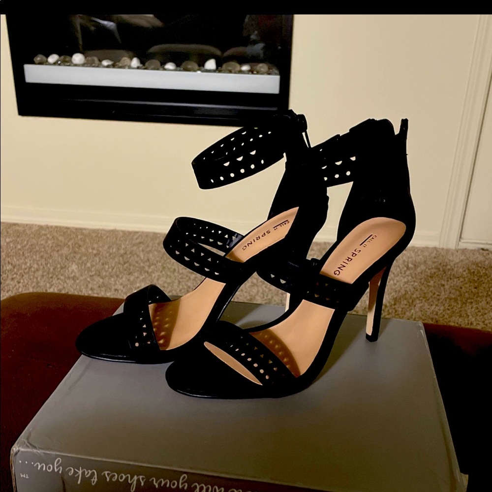 Black heels.Has never been worn.Prefect for a night out